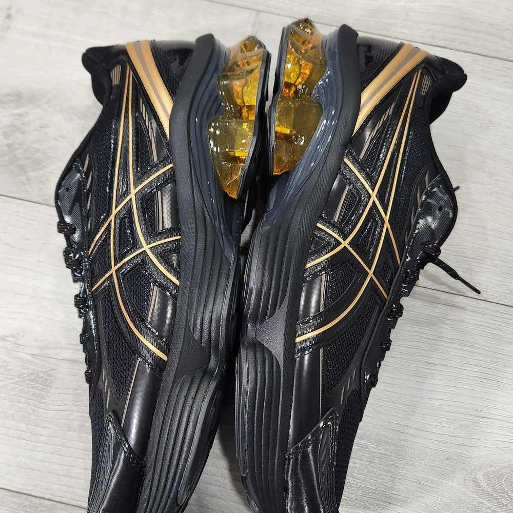 ASICS Men's Black and Gold Running Shoes. Size 9.0